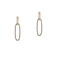 Yellow Gold Open Bar Diamond Huggies w/ Reversible White & Black Diamond Oval Extensions: A pair of 14K gold huggie earrings with extensions of one side featuring black diamonds and the other side featuring white diamonds
