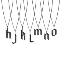 h - o Small Black Diamond Alphabet Necklaces: A series of oxidized sterling silver necklaces with black diamond letters, adjustable in length and featuring a lobster clasp fastening.
