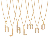 h -o Small White Diamond Alphabet Necklaces: A series of 14K gold necklaces with white diamond letters, adjustable in length and featuring a lobster clasp fastening.