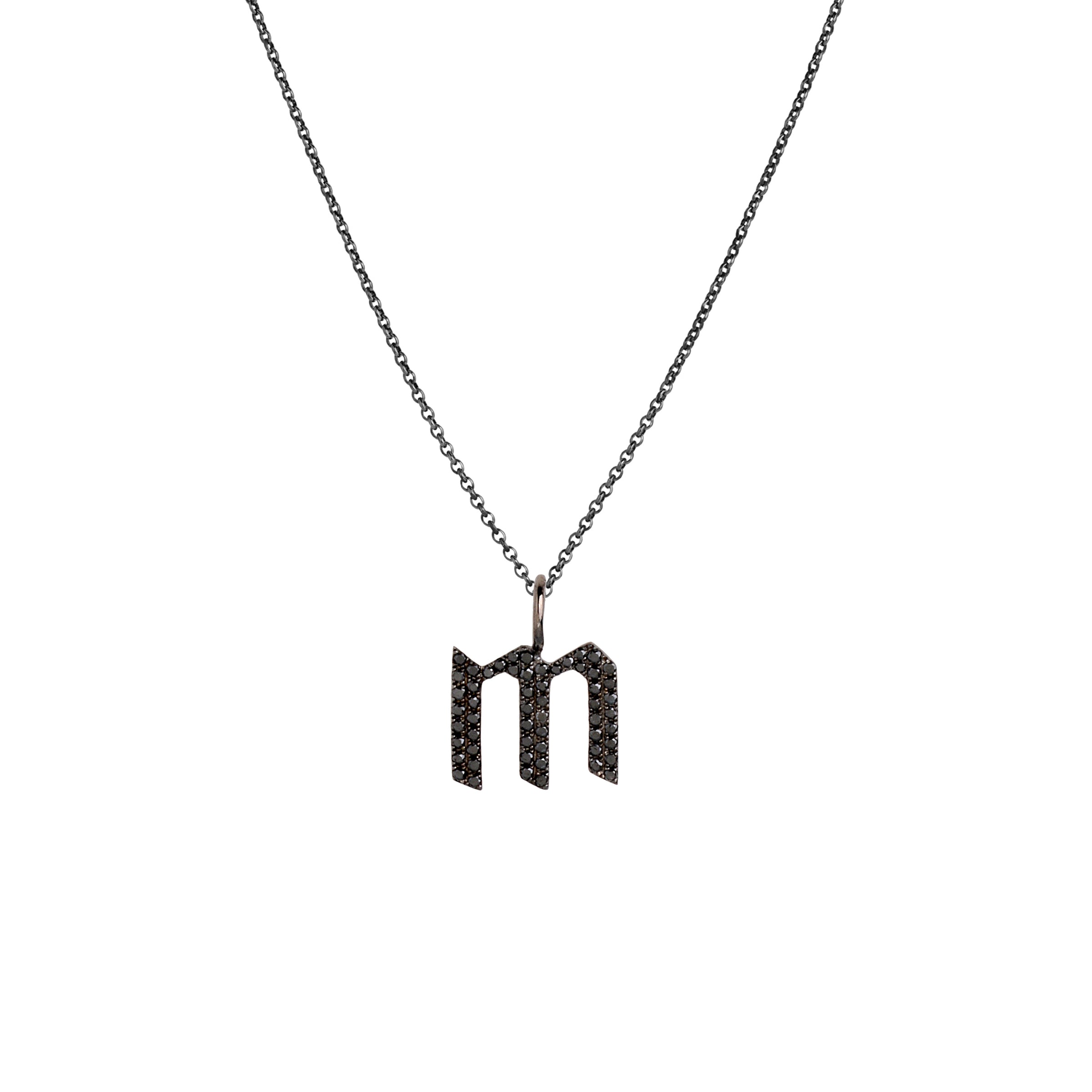 "m" Small Black Diamond Alphabet Necklace: A black gold diamond alphabet pendant with the letter 'm' with a chain