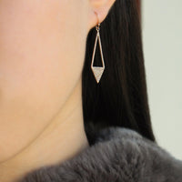 woman wearing the Diamond Arrow Earrings 