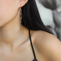 woman wearing the Diamond Honeycomb Earrings